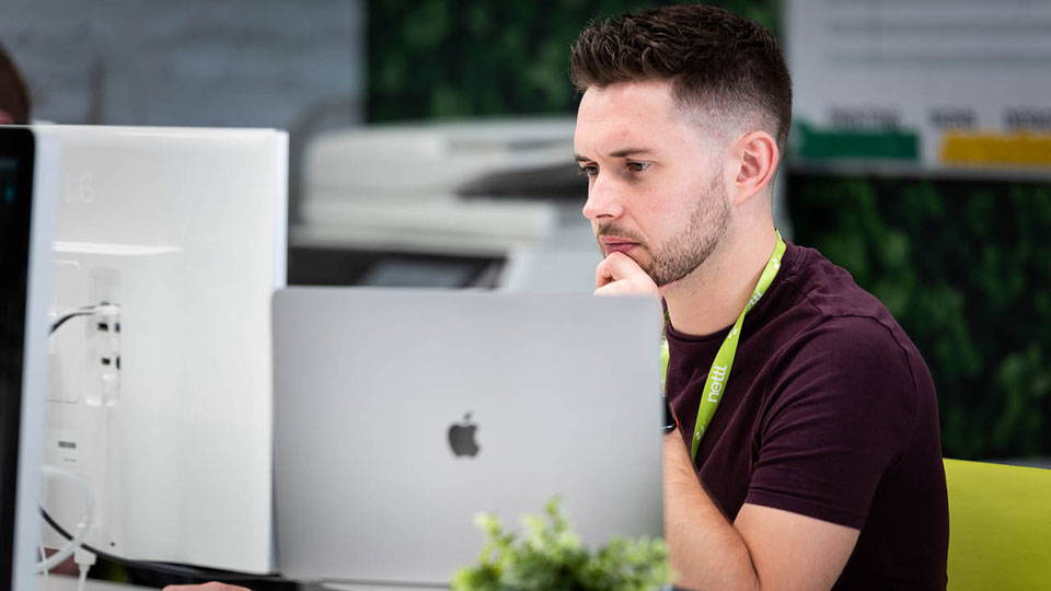 A Nettl specialist working efficiently on a marketing design task.