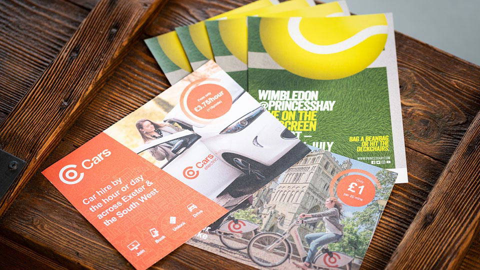 A display of multiple different physical print products.